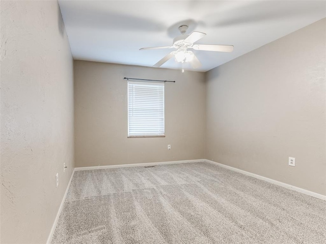 1505 W Blake St, El Reno, OK 73036 - carpeted spare room with ceiling fan and baseboards
