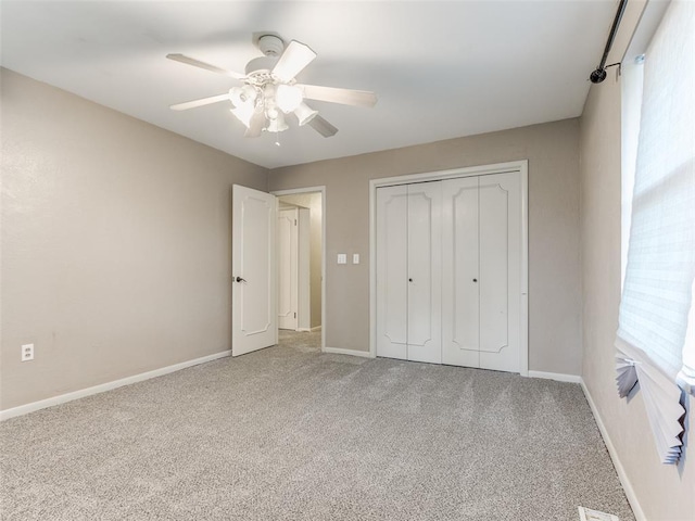 1505 W Blake St, El Reno, OK 73036 - unfurnished bedroom with carpet floors, a closet, and baseboards