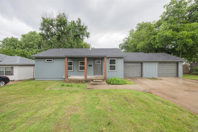 2817 N Donnelly Ave, Oklahoma City, OK 73107 - single story home with a porch, a front lawn, and driveway