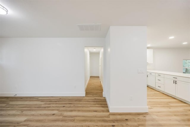 2817 N Donnelly Ave, Oklahoma City, OK 73107 - unfurnished room featuring light wood-style floors, recessed lighting, and baseboards