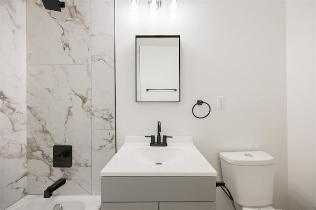 2817 N Donnelly Ave, Oklahoma City, OK 73107 - bathroom with vanity, washtub / shower combination, and toilet