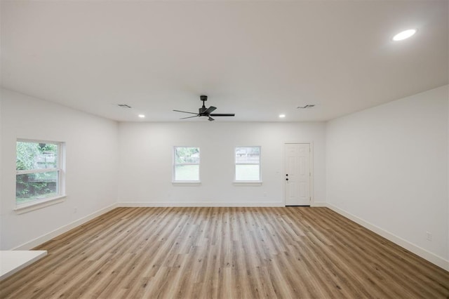 2817 N Donnelly Ave, Oklahoma City, OK 73107 - unfurnished room with light wood finished floors, baseboards, recessed lighting, and a ceiling fan