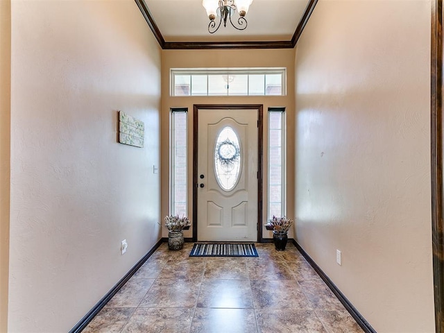 12275 Autumn Brk, Guthrie, OK 73044 - foyer entrance with crown molding, baseboards, and a chandelier