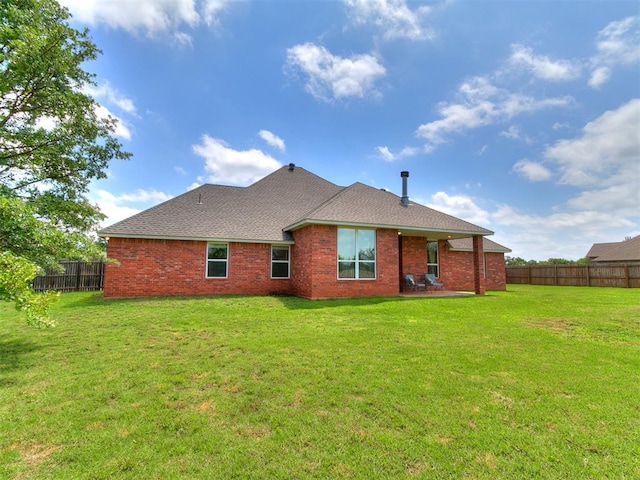 12275 Autumn Brk, Guthrie, OK 73044 - back of house with a patio, roof with shingles, and brick siding