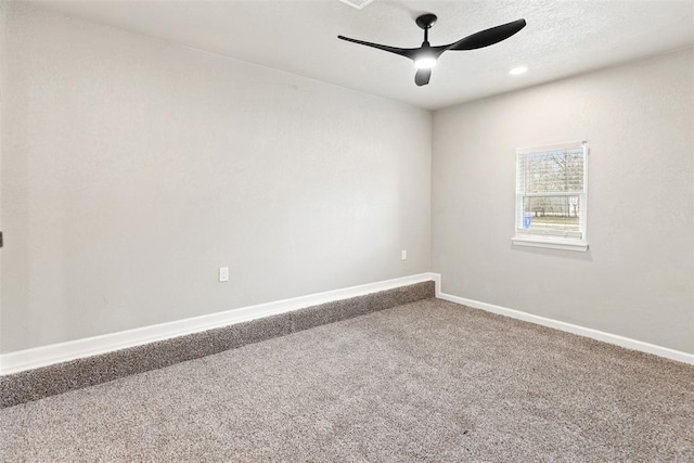 701 Iowa St, Norman, OK 73069 - unfurnished room featuring a ceiling fan, carpet, and baseboards