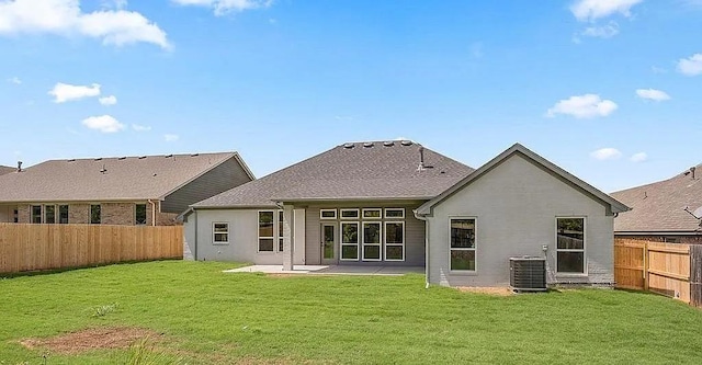 3921 Bandera Trl, Norman, OK 73071 - rear view of property featuring central AC, a patio, and stucco siding