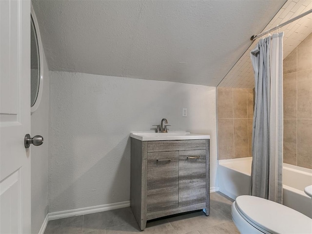 121 NW 27th St, Oklahoma City, OK 73103 - full bathroom with vaulted ceiling, shower / bath combo with shower curtain, vanity, toilet, and tile patterned floors