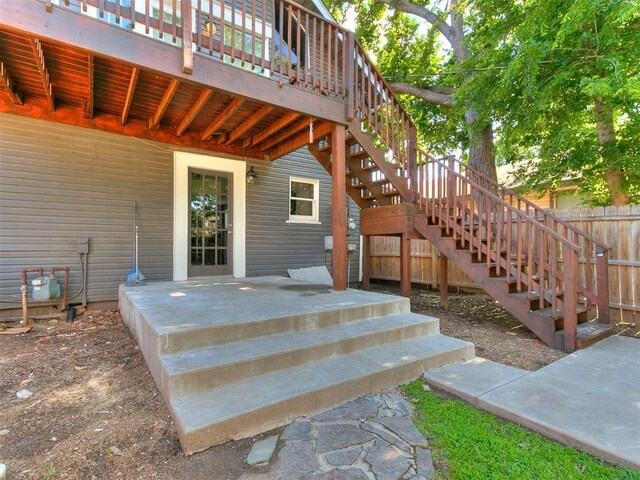 121 NW 27th St, Oklahoma City, OK 73103 - view of exterior entry featuring a wooden deck