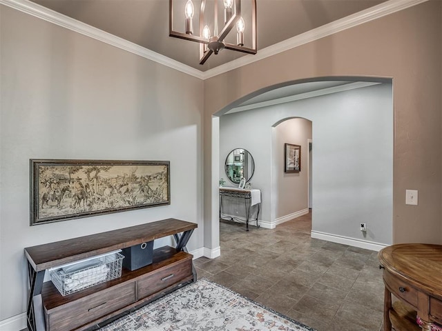 13505 Shady Pine Cir, Edmond, OK 73025 - hallway featuring arched walkways, a chandelier, baseboards, and ornamental molding