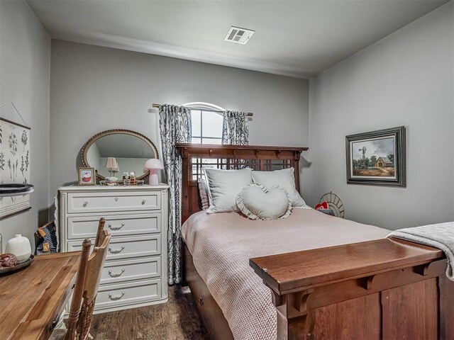 13505 Shady Pine Cir, Edmond, OK 73025 - bedroom featuring dark wood-style floors
