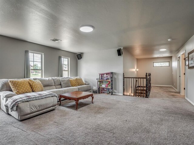 13505 Shady Pine Cir, Edmond, OK 73025 - carpeted living area featuring baseboards