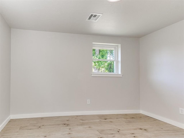 7624 NW 14th Ter, Oklahoma City, OK 73127 - unfurnished room featuring wood finished floors and baseboards