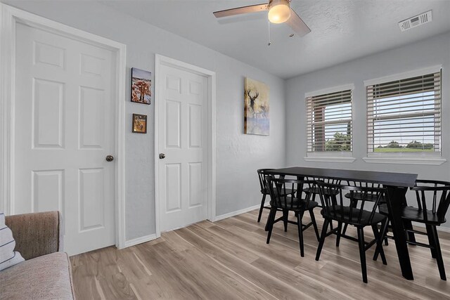 109 Cowan Ave, Fort Cobb, OK 73038 - dining area with light wood finished floors and ceiling fan