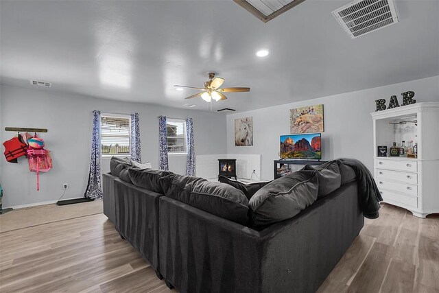 109 Cowan Ave, Fort Cobb, OK 73038 - living area featuring light wood-type flooring, a ceiling fan, and recessed lighting