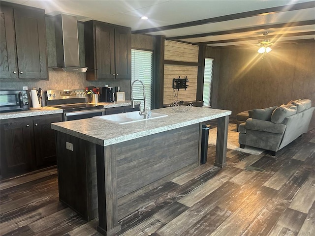 4341 Paradise Rd, Kingston, OK 73429 - kitchen featuring stainless steel electric range oven, wall chimney range hood, a sink, dark wood-style flooring, and black microwave