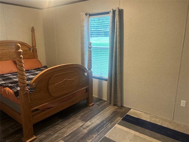 4341 Paradise Rd, Kingston, OK 73429 - bedroom with wood finished floors and multiple windows