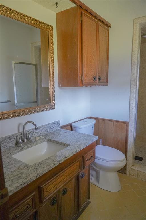 2313 SW 91st St, Oklahoma City, OK 73159 - bathroom with toilet, vanity, a shower stall, and tile patterned floors