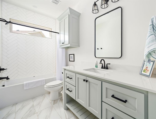 713 Harbor Town Dr, Edmond, OK 73034 - bathroom featuring toilet, vanity, shower / bath combination with curtain, and marble look tile flooring