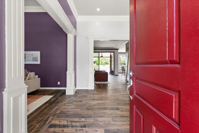 14705 Longford Way, Edmond, OK 73013 - entrance foyer with ornamental molding, dark wood-style flooring, baseboards, recessed lighting, and decorative columns