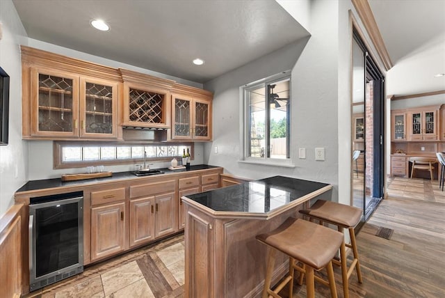 14705 Longford Way, Edmond, OK 73013 - indoor wet bar featuring wine cooler, recessed lighting, and healthy amount of natural light