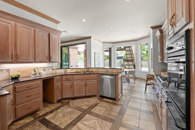 14705 Longford Way, Edmond, OK 73013 - kitchen featuring dishwasher, inlaid floor details, ornamental molding, a peninsula, and plenty of natural light