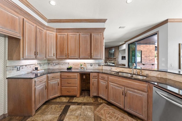 14705 Longford Way, Edmond, OK 73013 - kitchen with dishwasher, a sink, inlaid floor details, backsplash, and dark stone countertops