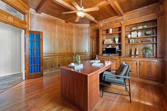 14705 Longford Way, Edmond, OK 73013 - office space featuring wood ceiling with exposed beams, wooden walls, ceiling fan, coffered ceiling, and crown molding