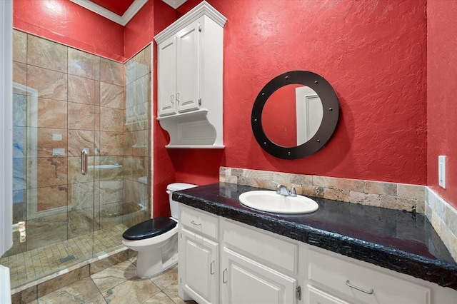 14705 Longford Way, Edmond, OK 73013 - bathroom with vanity, a shower stall, toilet, ornamental molding, and a textured wall