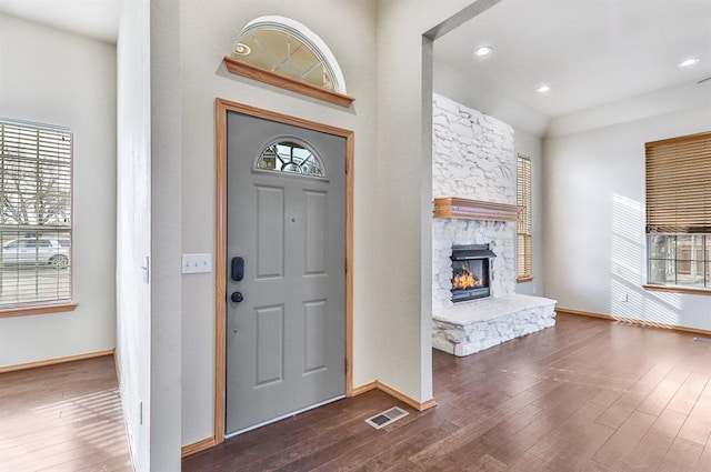 4931 SE 54th St, Oklahoma City, OK 73135 - entrance foyer with wood-type flooring, a fireplace, and recessed lighting