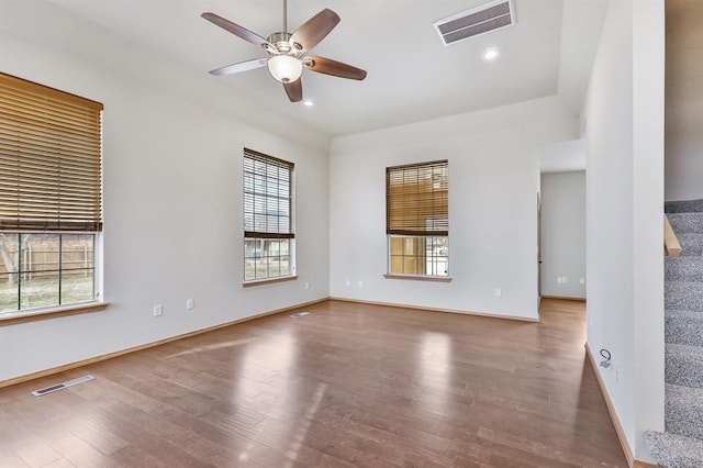 4931 SE 54th St, Oklahoma City, OK 73135 - unfurnished room with healthy amount of natural light, wood finished floors, ceiling fan, and recessed lighting