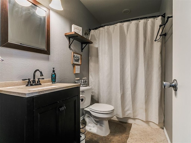 13005 Willowcrest Ln, Oklahoma City, OK 73170 - full bathroom with toilet, vanity, a shower with curtain, tile patterned floors, and a textured wall