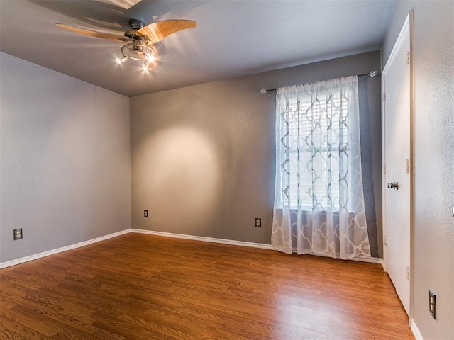 13005 Willowcrest Ln, Oklahoma City, OK 73170 - empty room featuring ceiling fan, wood finished floors, and baseboards