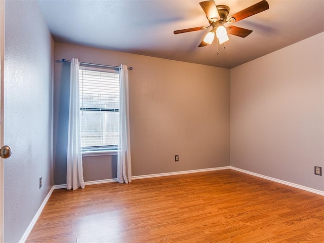 13005 Willowcrest Ln, Oklahoma City, OK 73170 - unfurnished room featuring light wood-style flooring, a ceiling fan, and baseboards