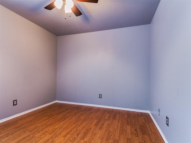 13005 Willowcrest Ln, Oklahoma City, OK 73170 - spare room with ceiling fan, wood finished floors, and baseboards