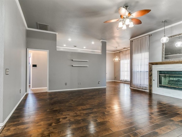 13005 Willowcrest Ln, Oklahoma City, OK 73170 - unfurnished living room with crown molding, ceiling fan, hardwood / wood-style flooring, baseboards, and a glass covered fireplace