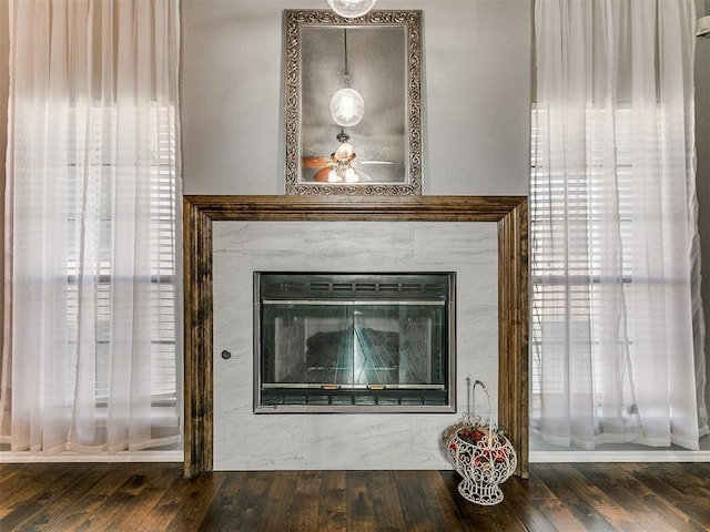 13005 Willowcrest Ln, Oklahoma City, OK 73170 - detailed view of wood finished floors and a tile fireplace