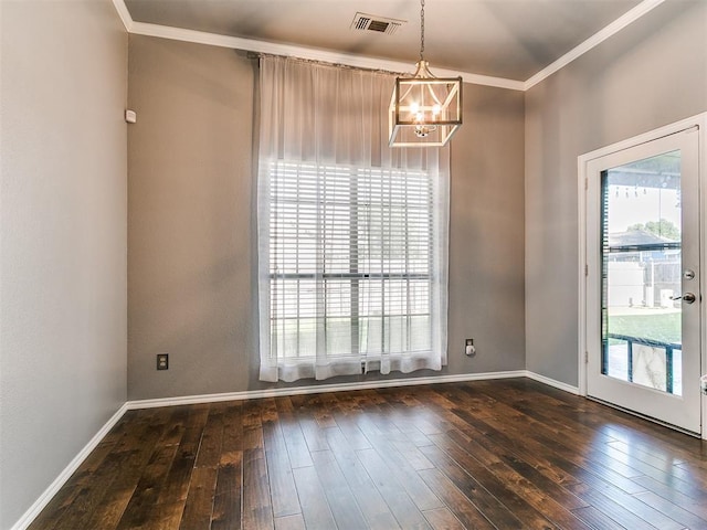 13005 Willowcrest Ln, Oklahoma City, OK 73170 - spare room featuring healthy amount of natural light, a chandelier, hardwood / wood-style flooring, crown molding, and baseboards