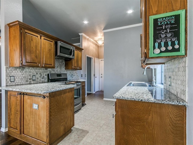 13005 Willowcrest Ln, Oklahoma City, OK 73170 - kitchen with stainless steel appliances, ornamental molding, a sink, backsplash, and baseboards