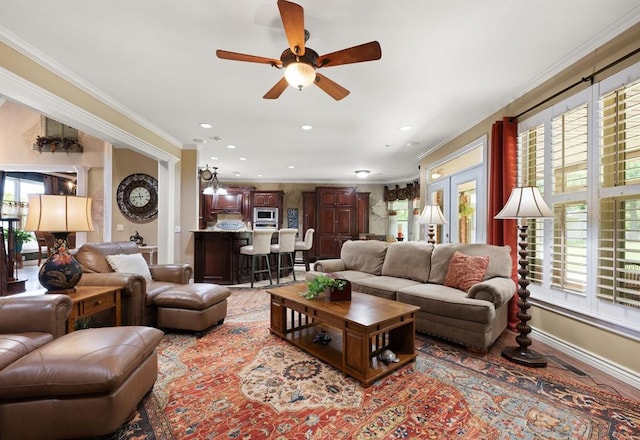 910744 S 3440th Rd, Chandler, OK 74834 - living room with ornamental molding, a ceiling fan, healthy amount of natural light, recessed lighting, and baseboards