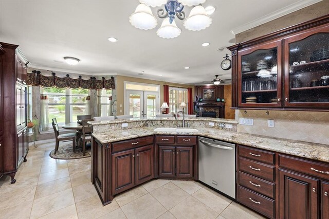 910744 S 3440th Rd, Chandler, OK 74834 - kitchen with stainless steel dishwasher, a sink, ornamental molding, a chandelier, and a peninsula