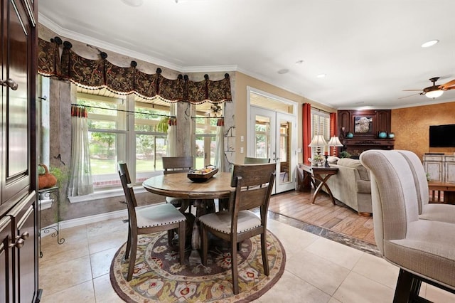 910744 S 3440th Rd, Chandler, OK 74834 - dining room featuring light tile patterned flooring, crown molding, a ceiling fan, baseboards, and french doors