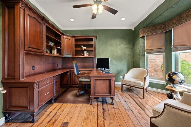 910744 S 3440th Rd, Chandler, OK 74834 - home office with light wood-style floors, built in desk, a ceiling fan, ornamental molding, and baseboards