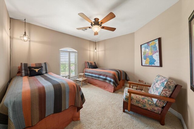 910744 S 3440th Rd, Chandler, OK 74834 - carpeted bedroom featuring a ceiling fan and baseboards