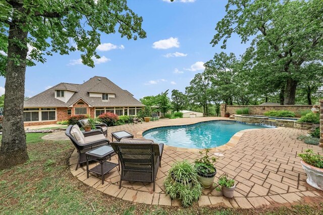 910744 S 3440th Rd, Chandler, OK 74834 - outdoor pool with a patio area, a fenced backyard, and an in-ground hot tub