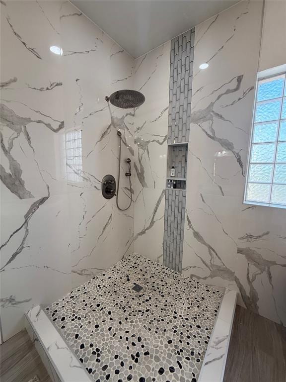 1030 Belmonte Ct, Yukon, OK 73099 - bathroom with a marble finish shower and stone wall
