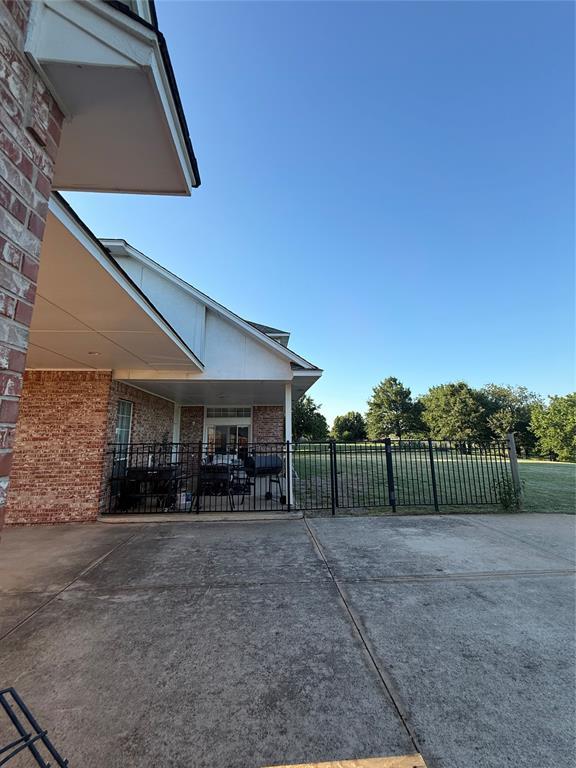 1030 Belmonte Ct, Yukon, OK 73099 - view of patio / terrace