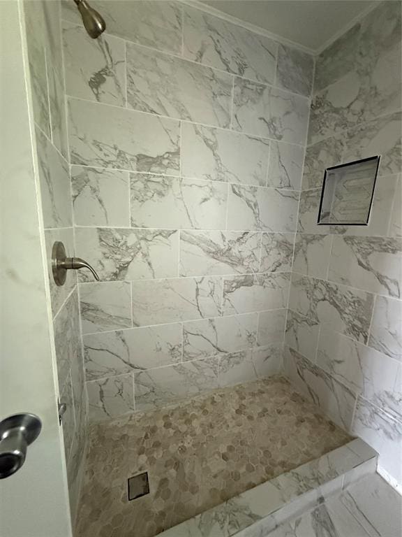 3208 N Roff Ave, Oklahoma City, OK 73112 - full bathroom with a tile shower and marble finish flooring
