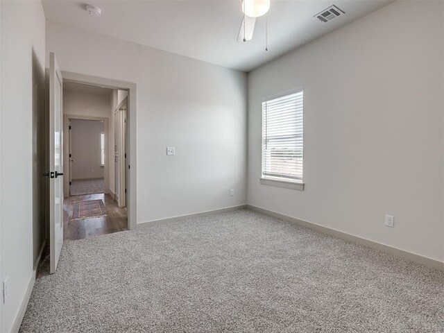 5617 NW 155th St, Edmond, OK 73013 - empty room with carpet flooring, a ceiling fan, and baseboards