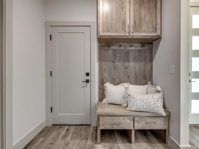 5617 NW 155th St, Edmond, OK 73013 - mudroom featuring wood finished floors and baseboards