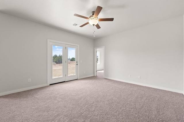 5201 Grassland Dr, Guthrie, OK 73044 - spare room featuring carpet floors, a ceiling fan, and baseboards